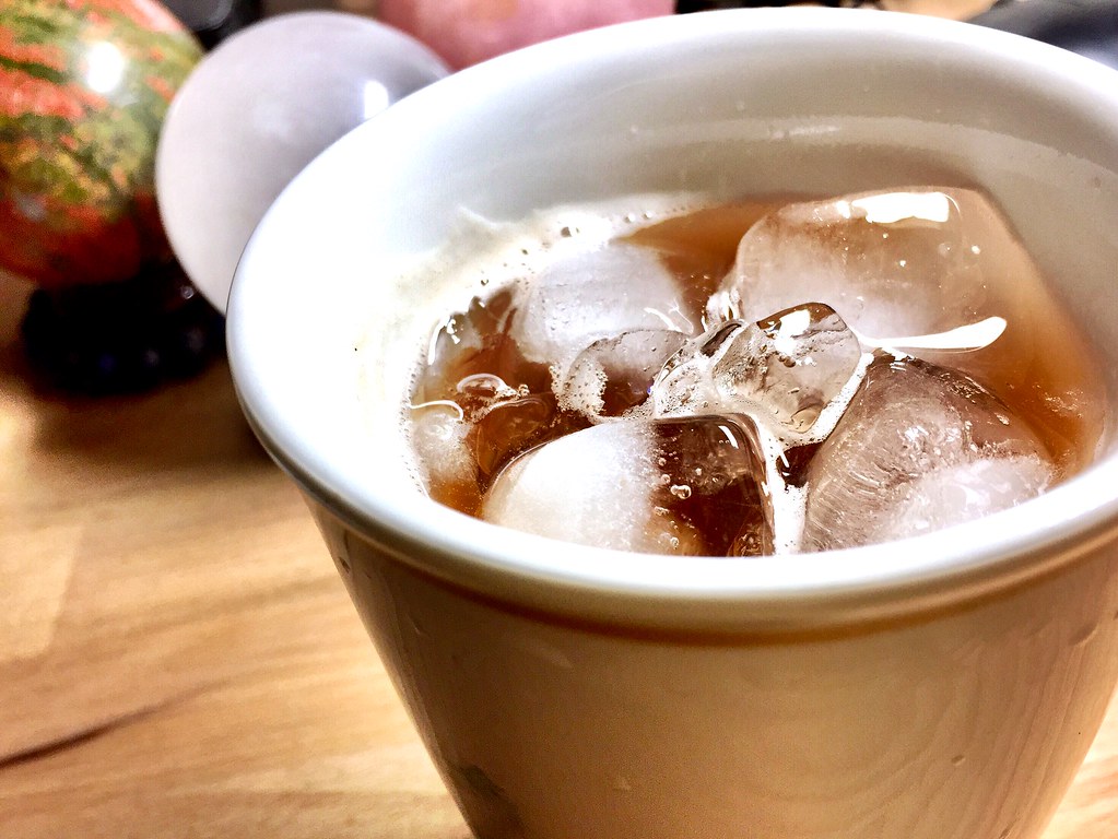 Iced drink in a ceramic cup, close-up